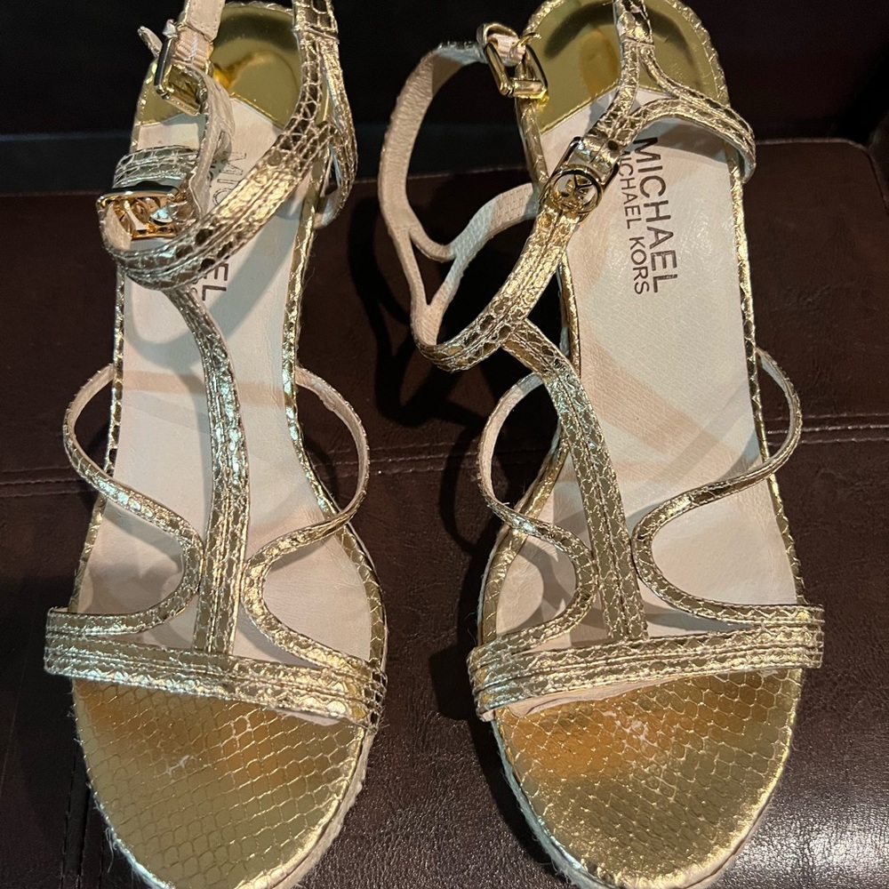 Michael Kors wedge sandal in gold. Never worn.